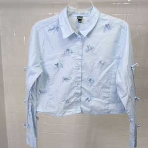 Light Blue Women's Top with Bow Accents